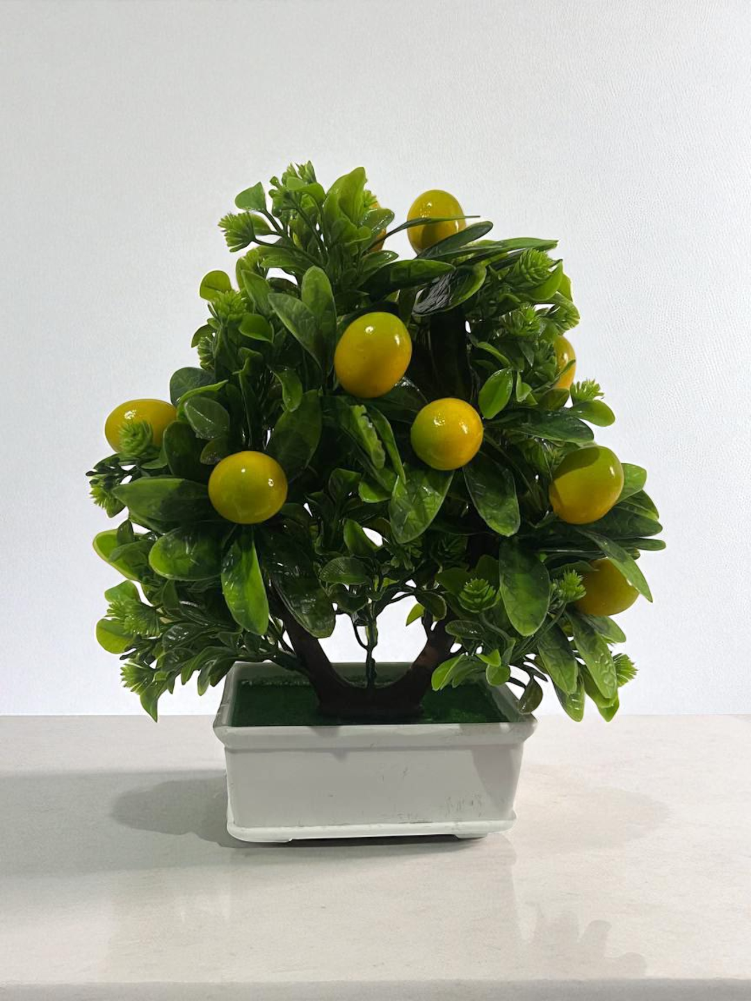 Искусственные цветы в горшке — фото 1