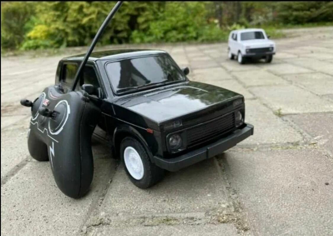 Машинка на пульте управления Лада нива 4x4, черная, 1:12 — фото 1