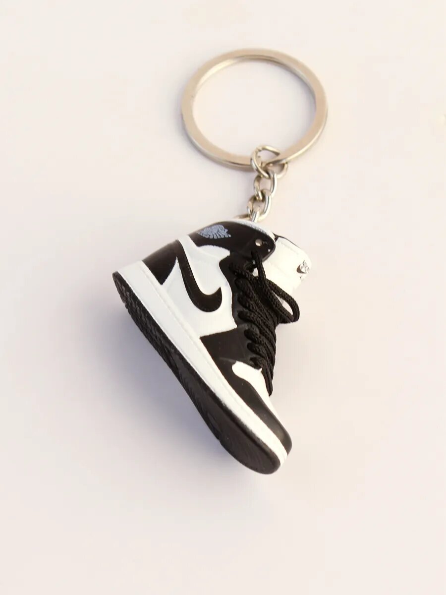 Брелок, черный, белый — фото 1