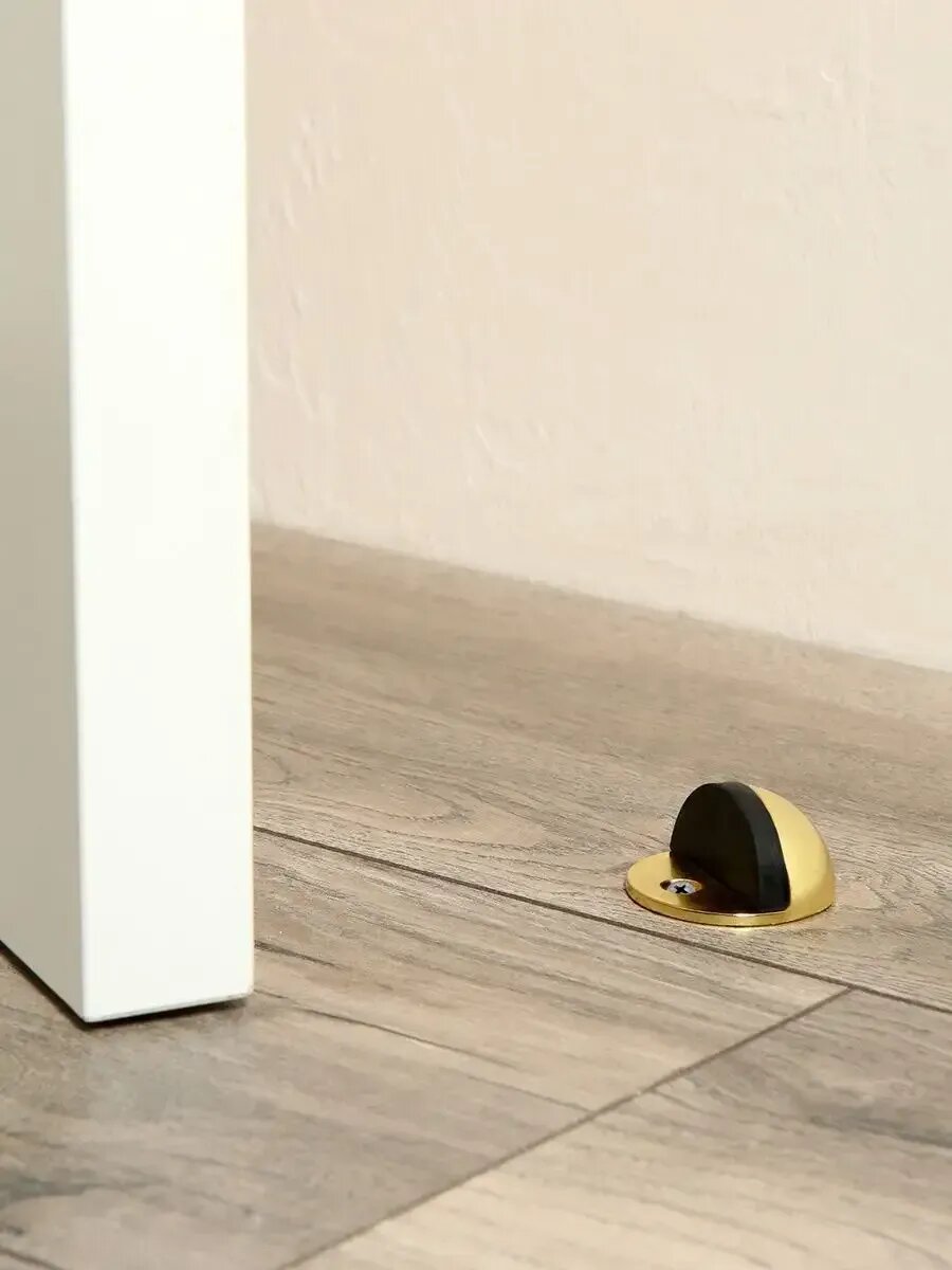 Современный напольный ограничитель для двери