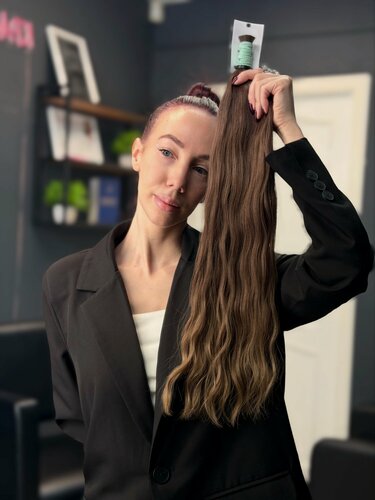 Изображение товара Натуральные волосы для наращивания 60 см 108 грамм одноголовые срезы русый волна для капсуляции