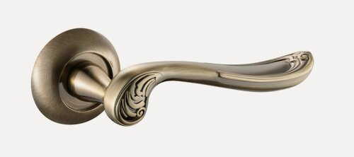 Изображение товара Ручки дверные Adden Bau, коллекция Absolut, TURN A134 POLISH BRONZE на круглой розетке