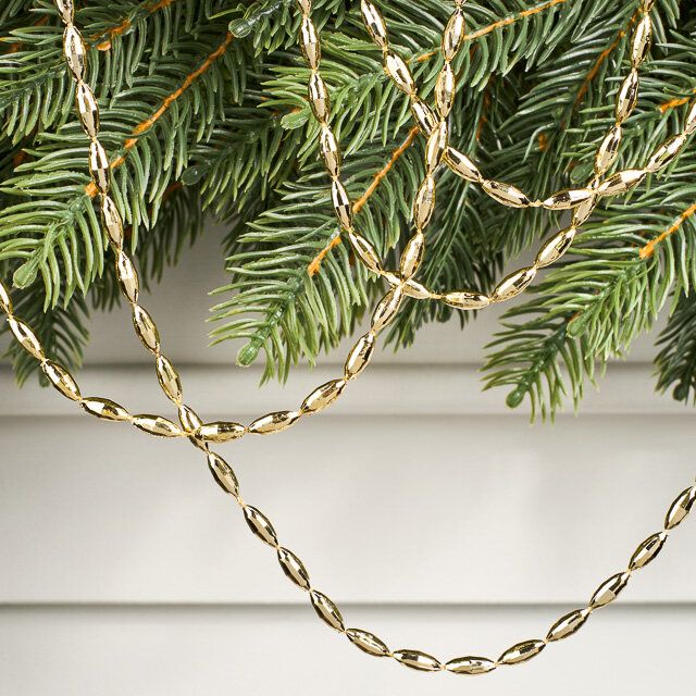 Бусы на елку Radiance 270 см светло-золотые пластиковые