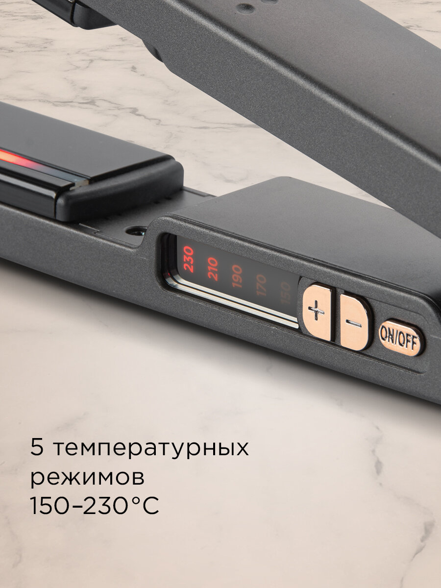 Выпрямитель редмонд hs1718 в руках с подсветкой индикатора нагрева