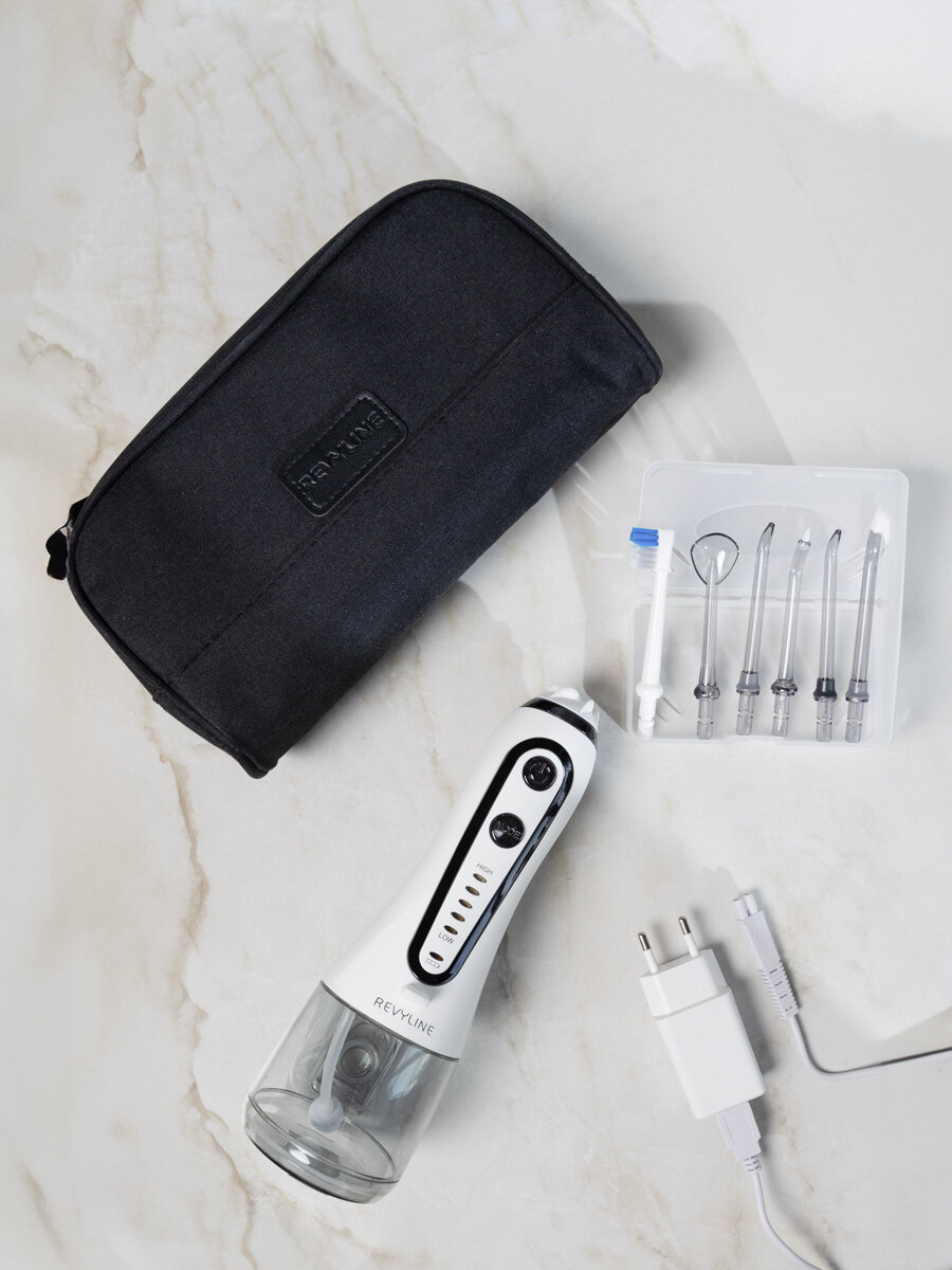 Ирригатор Revyline RL450 PRO, для взрослых, 6 насадок, питание от аккумулятора — фото 1