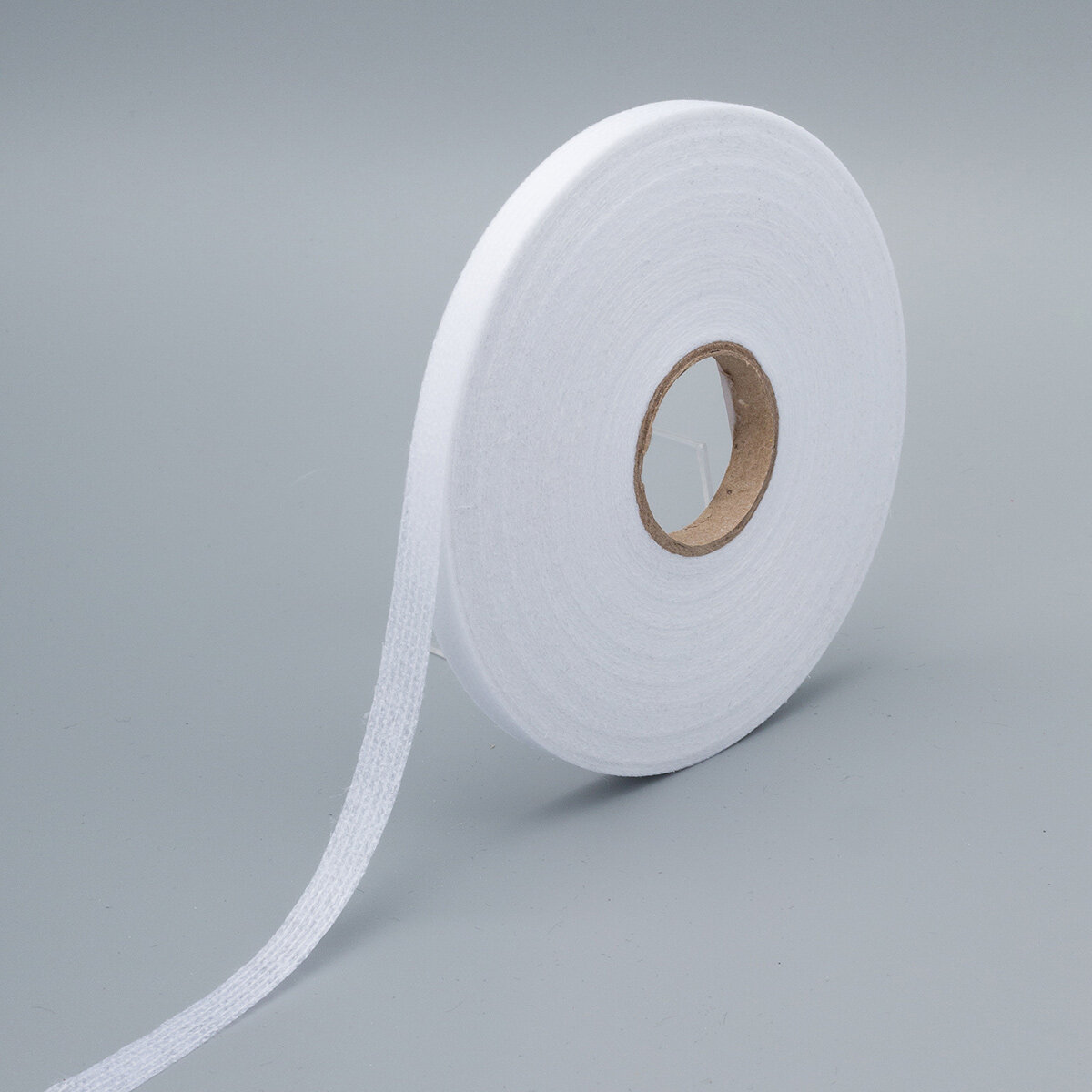 Лента нитепрошивная клеевая по долевой 10 мм*100м цвет белый