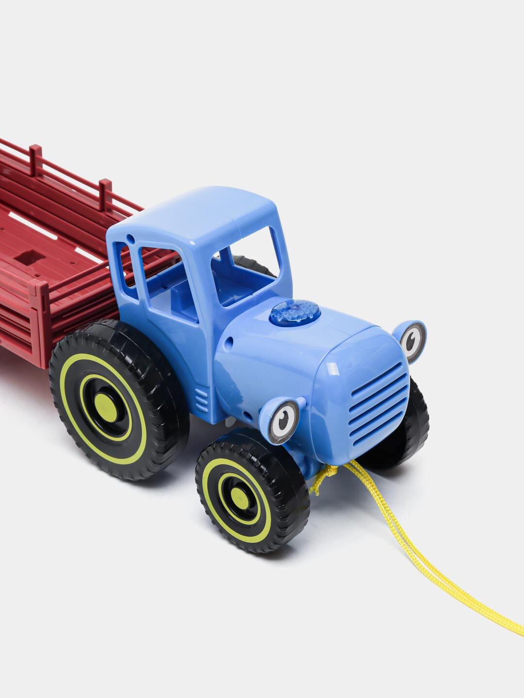 "Moviy traktor" musiqali o'yinchoq mashinasi — фото 1