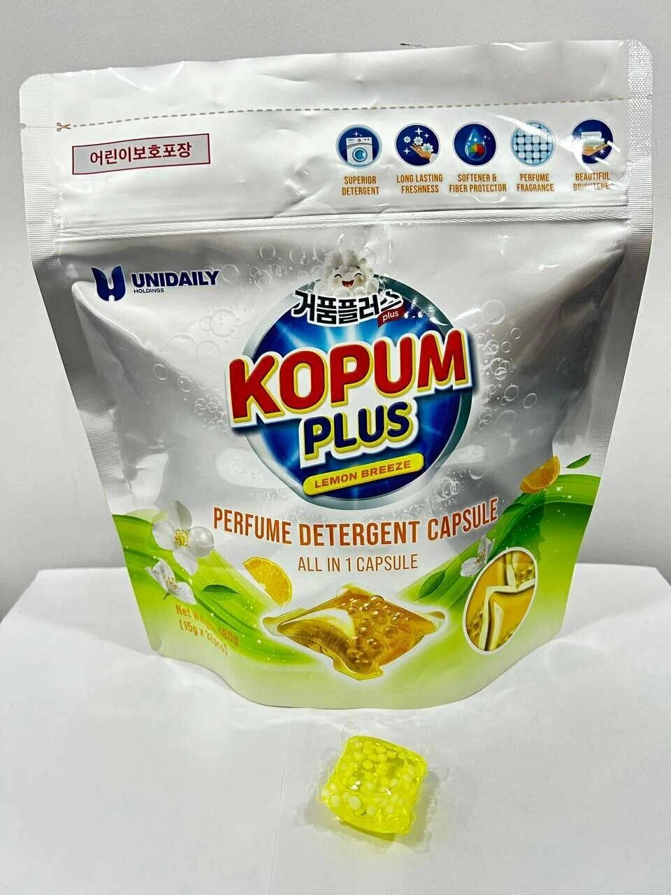Kapsuly Kopum Plus для стирки: 32 капсулы, аромат, мягкий уход, подходит для 7 кг белья