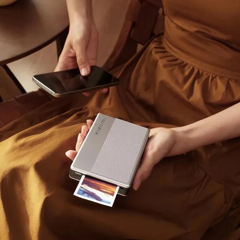 Семейный альбом с фотографиями от Xiaomi Pocket Photo Printer 1s