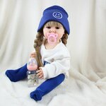 Виниловая кукла Реборн (Reborn Dolls) - Девочка в белом свитере, с косичками (56 см) - изображение