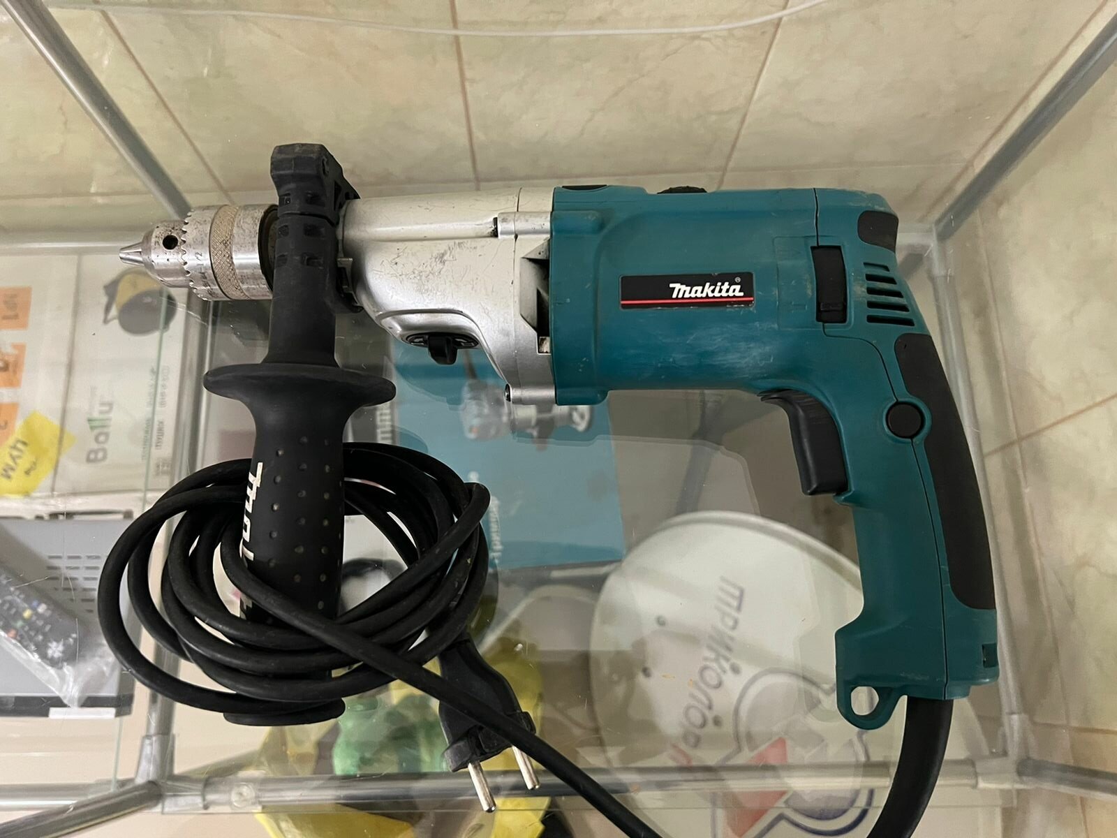 Ударная дрель Makita HP 2070