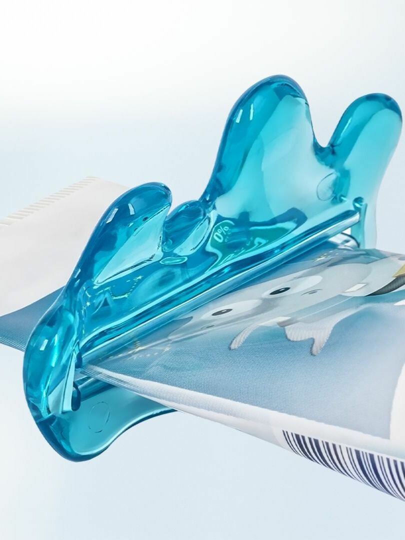 Ключ для выдавливания зубной пасты Flipper SQUEEZER экономия до последней капли, универсальный — фото 1