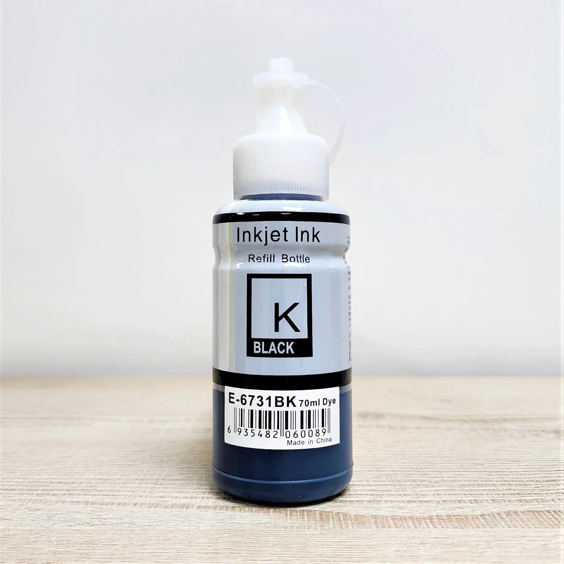 Epson E-673 BK (чёрный) чернила 70 мл (в бутылке). Совместимы с принтерами Epson серий EcoTank: L800, L805, L810, L850, L1800 и другими.