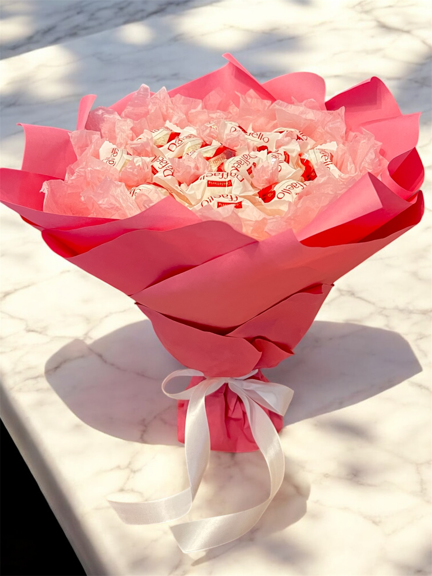 Букет Raffaello "Нежность" из 15 конфет высота 35 см с бантом