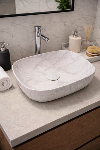Изображение товара Раковина накладная для тумбы в ванную 47x38 Овал фарфоровая под белый мрамор Aurastone