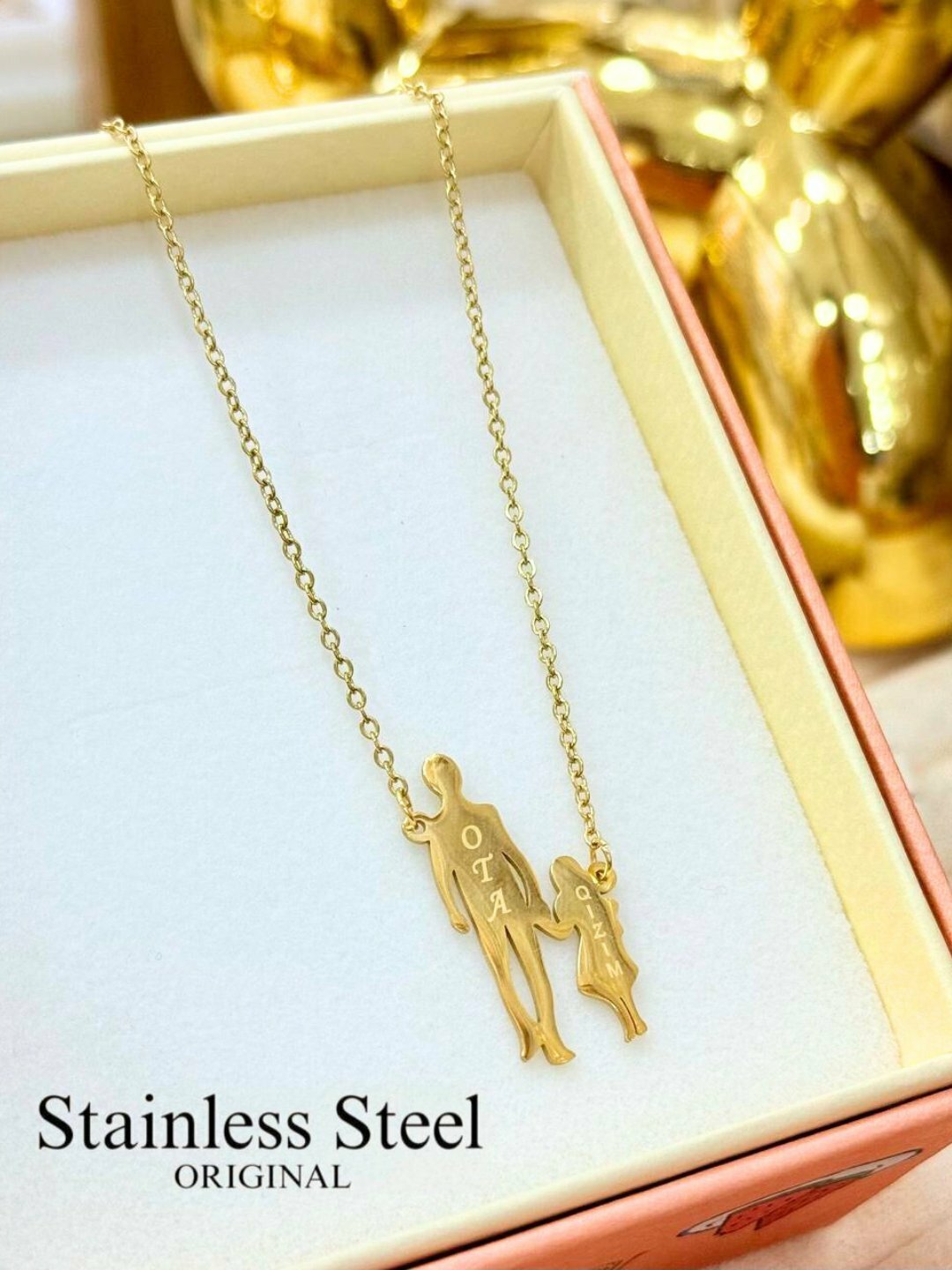 Украшение, для женщин, из золота, с подвесками в форме отца и дочери