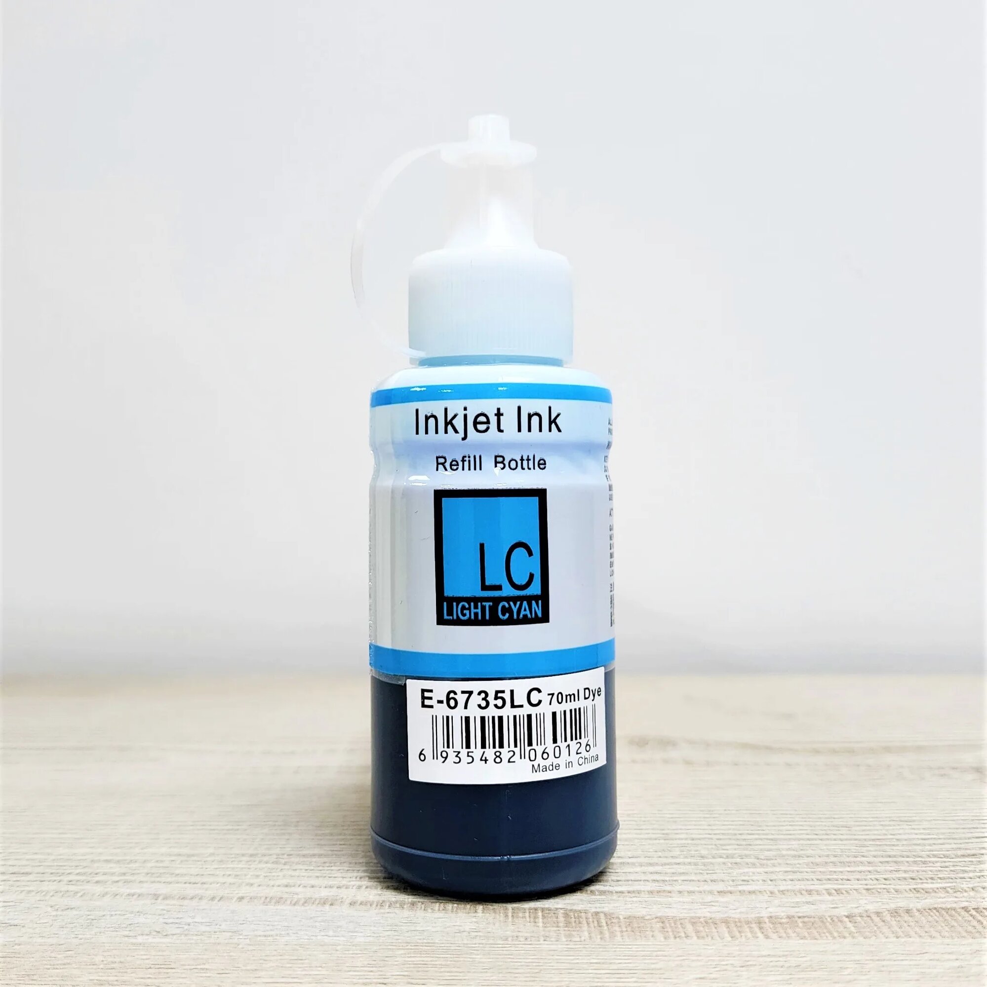 Epson E‑673 (LC) Light Cyan (светло-синий) чернила 70 мл (в бутылке). Совместимы с принтерами Epson серий EcoTank: L800, L805, L810, L850, L1800 и другими.