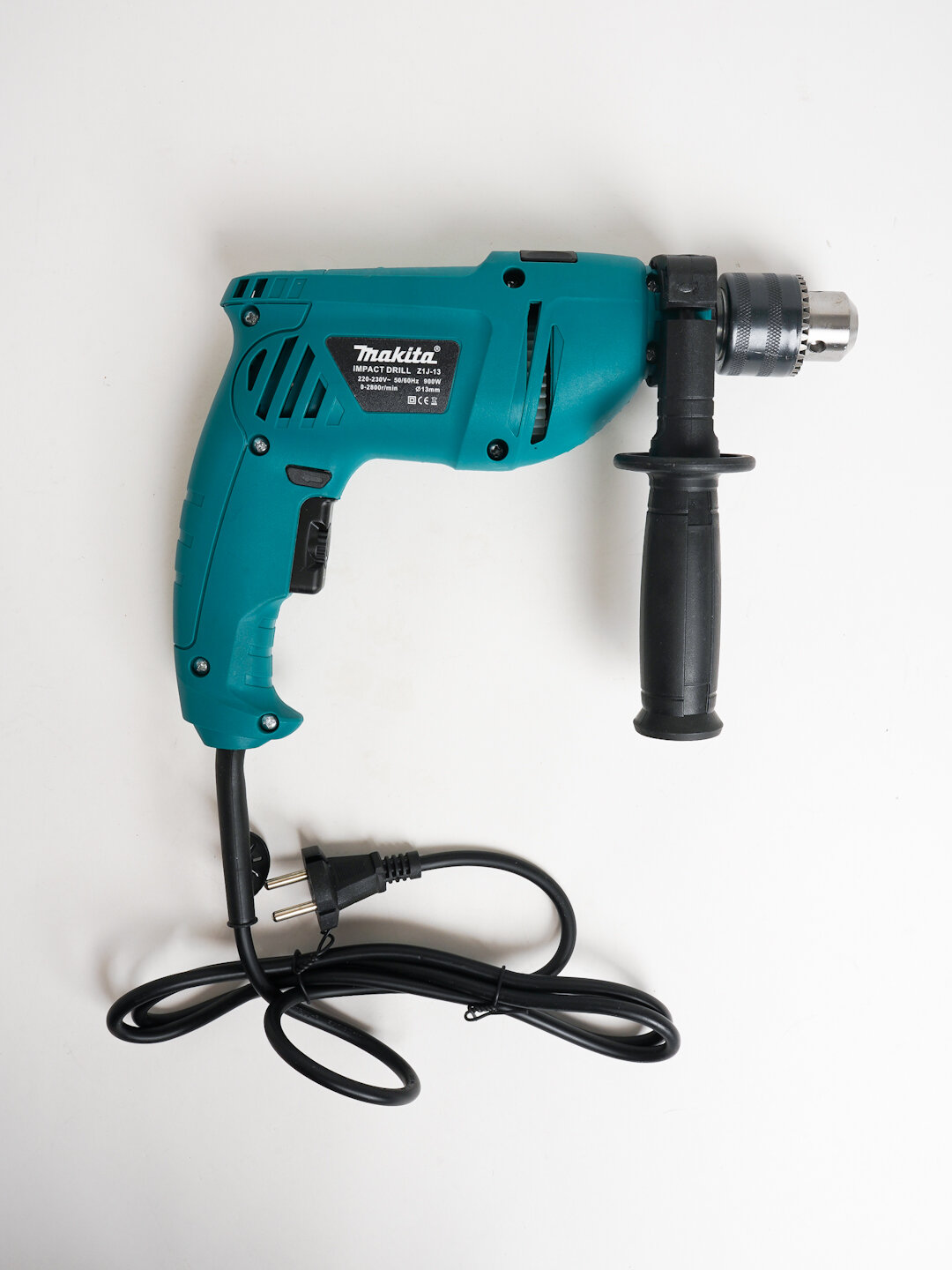 Ударный дрель Makita : с мощностью 900 W, быстрозажимной патрон — фото 1