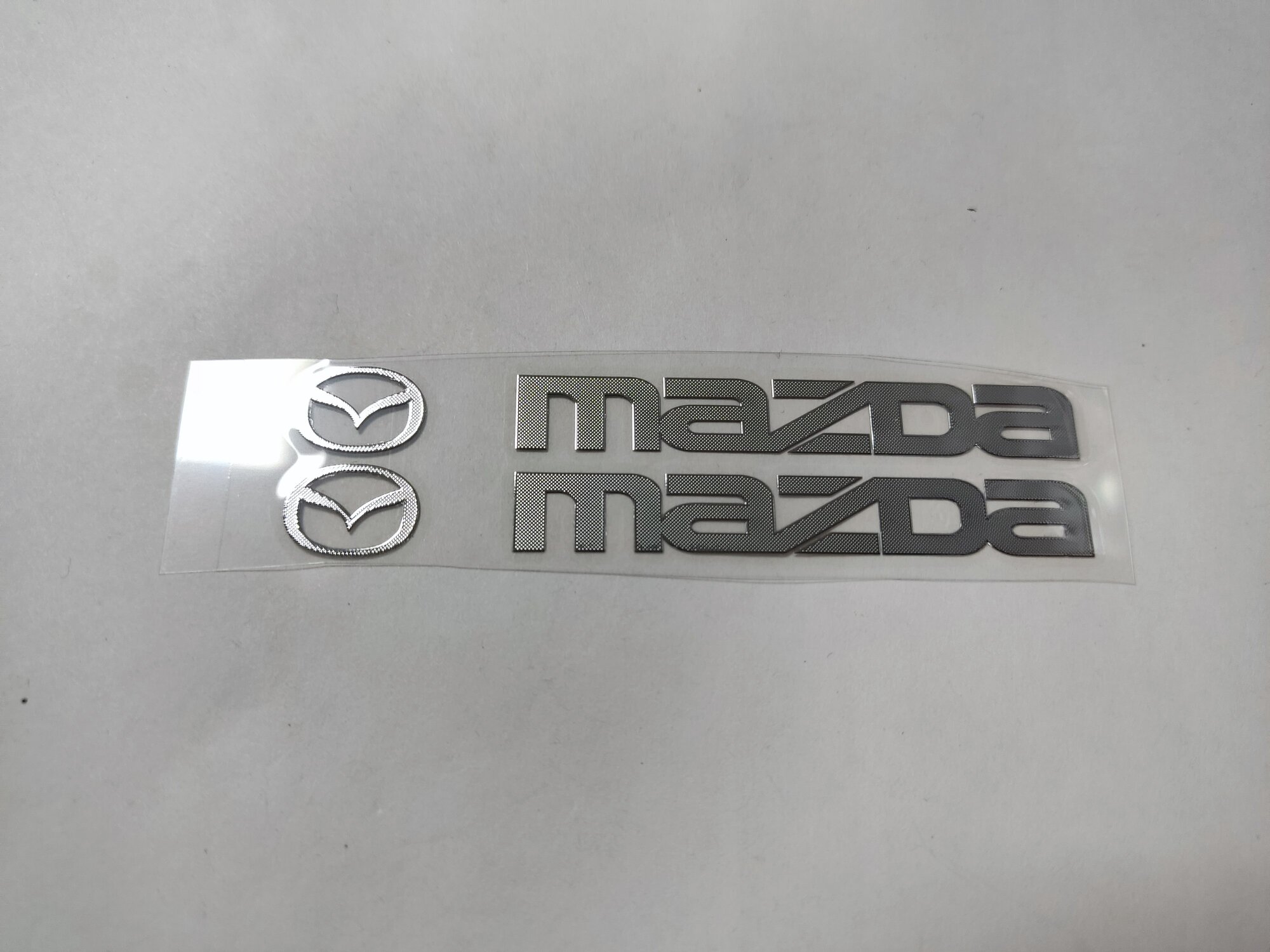 Шильдик "Mazda", металл, самоклеящийся, хром, серебристый, 90 мм