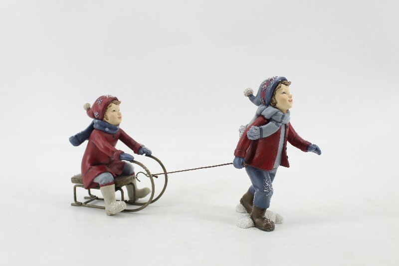 Сувенир " Мальчик с девочкой на санях" (мальчик 8.5*6.8*13.7см, девочка 10.7*6.7*12см)