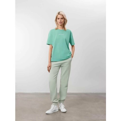 фото Брюки спортивные just clothes светло-ментоловый. декор вышивка логотипа. пояс резинка, шнурок. карманы спереди 2 б/заст, сзади нет, размер 38, мятный