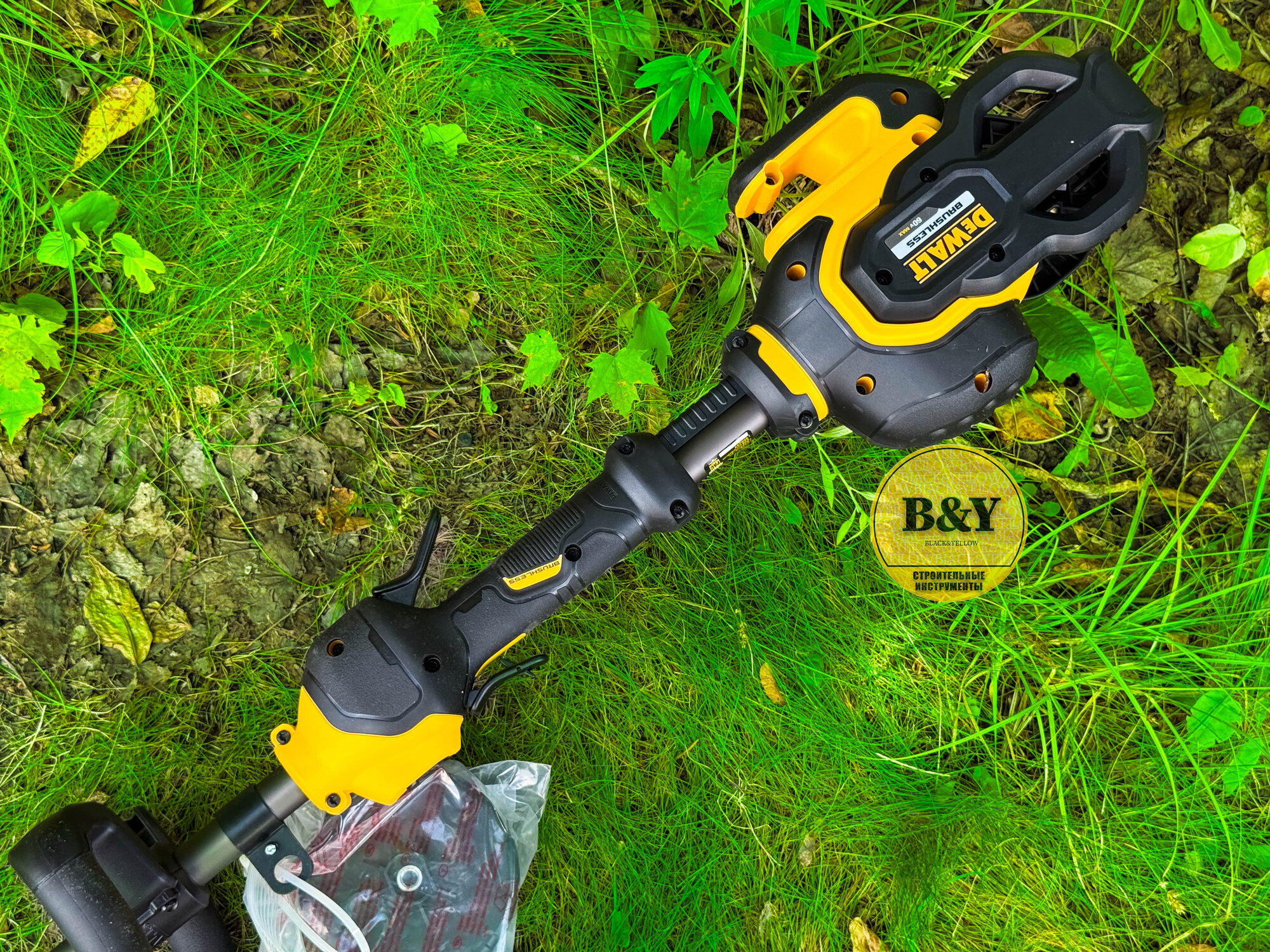 Садовый аккумуляторный триммер DeWALT DCM5713N 60В, Li-ion . — фото 1