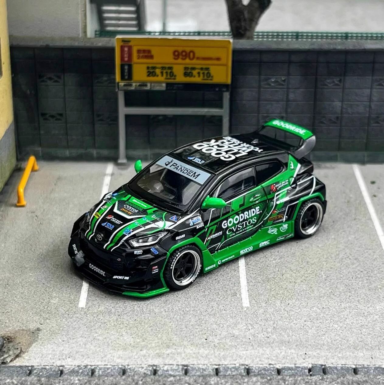 Коллекционная машинка Enigma x Pop Race 1:64 Toyota GR Yaris Pandem Rocket Bunny Goodride Green-Black