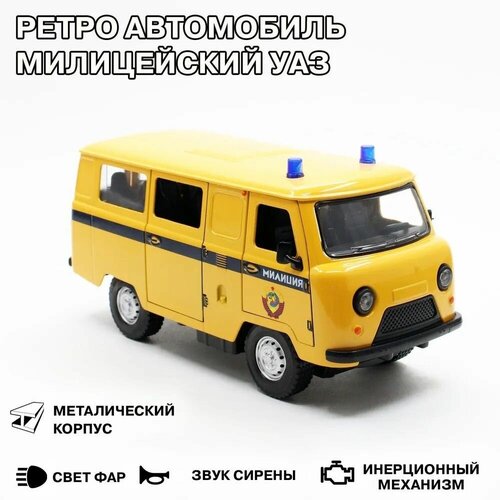 Коллекционная металлическая модель автомобиля милиции УАЗ Буханка в масштабе 1:24