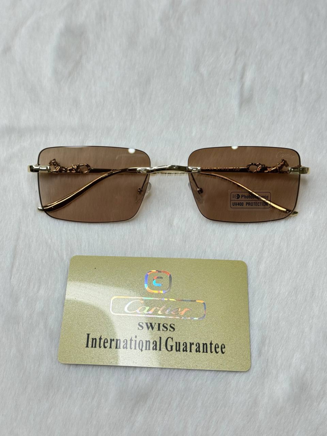 Солнцезащитные очки Cartier, коричневый — фото 1