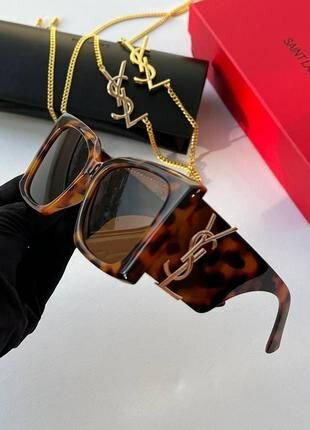 Солнцезащитные очки Saint Laurent, бежевый, синий, черный, белый, золотой — фото 1