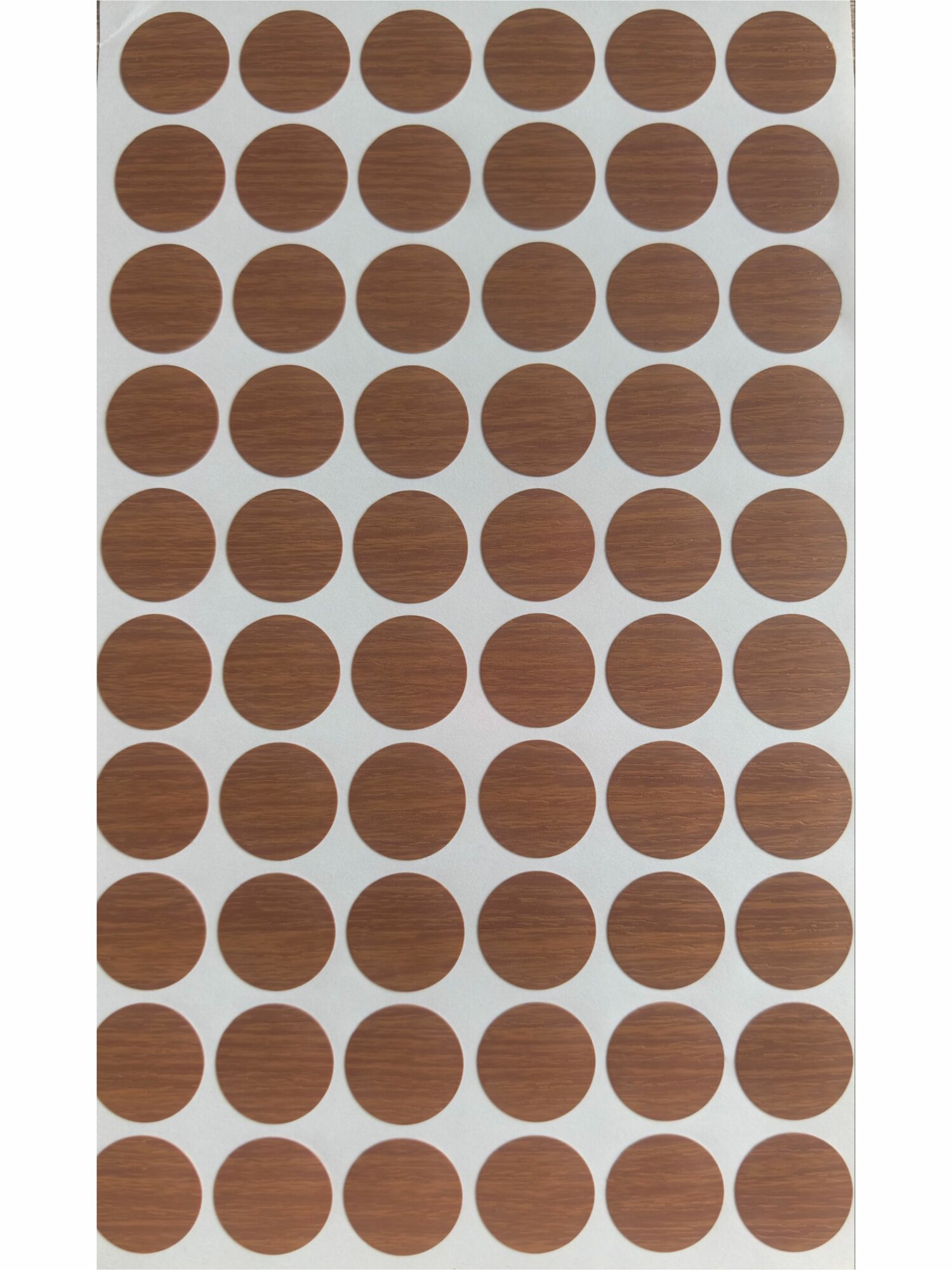 Самоклеящаяся заглушка для мебели цвет орех итальянский D 18мм на 1 листе 60 шт.