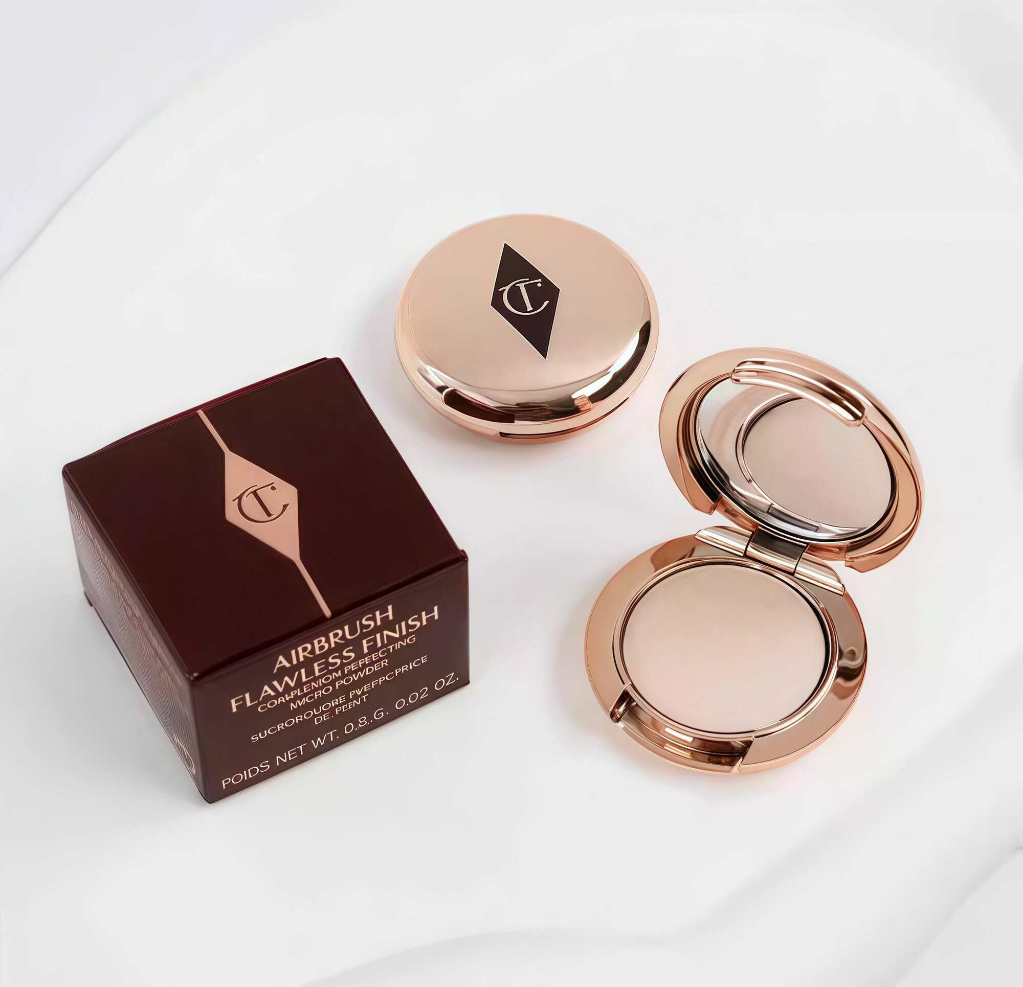 Charlotte Tilbury пудра для лица, Естественный цвет, сохраняет макияж на 24 часа 0,8 г，01#