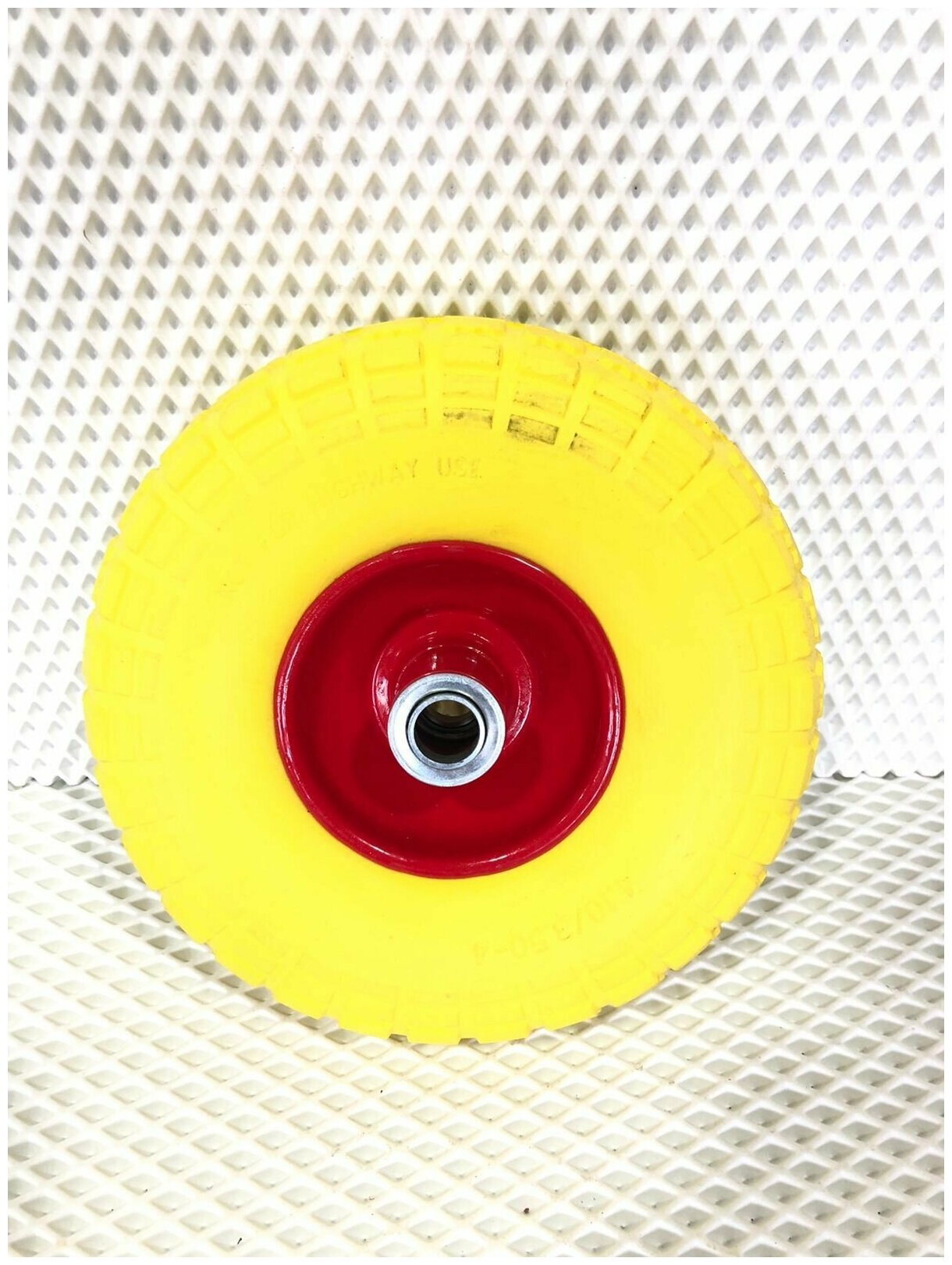 Бескамерное колесо для строительной тачки 4.10/3.50-4 D 260 мм, ось 20мм - фотография № 1