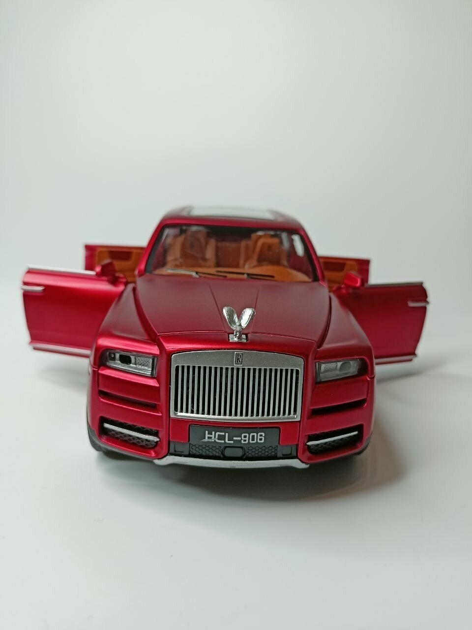 Модель автомобиля Rolls Royce Сullinan коллекционная металлическая игрушка масштаб 1:24 красный