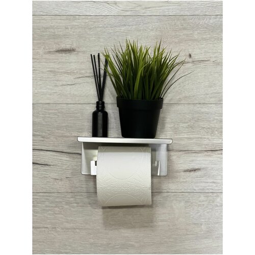 Держатель для туалетной бумаги с полочкой