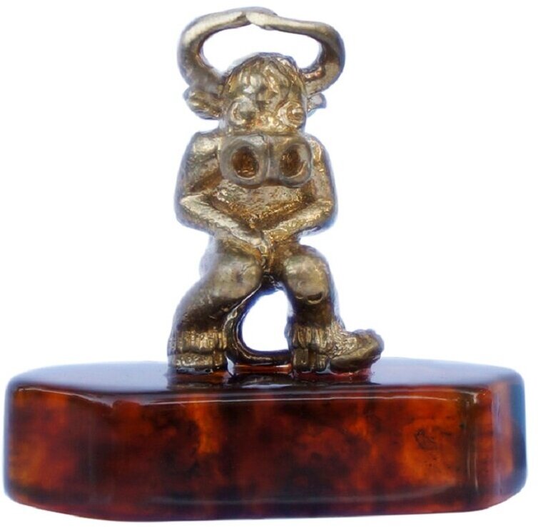 фото Сувенир "Бычок" на подставке из натурального янтаря