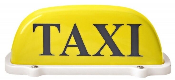 Знак TAXI желтый свет