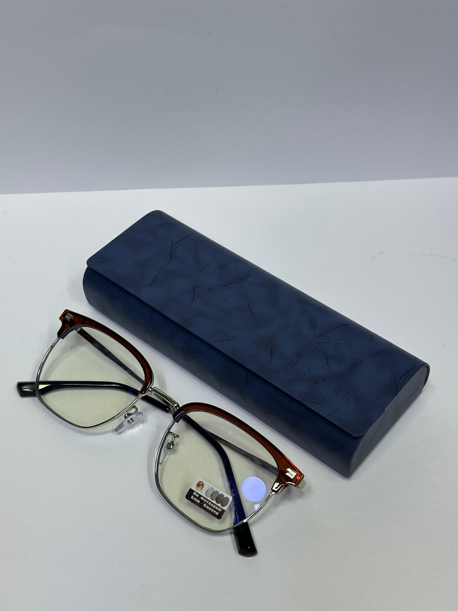 HAMILYON — Данные очки оснащены фотохромными линзами которые автоматически меняют цвет