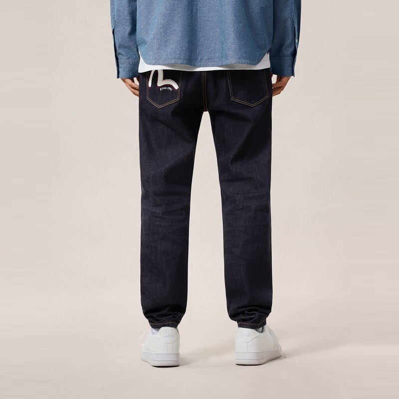 Джинсы зауженные Evisu