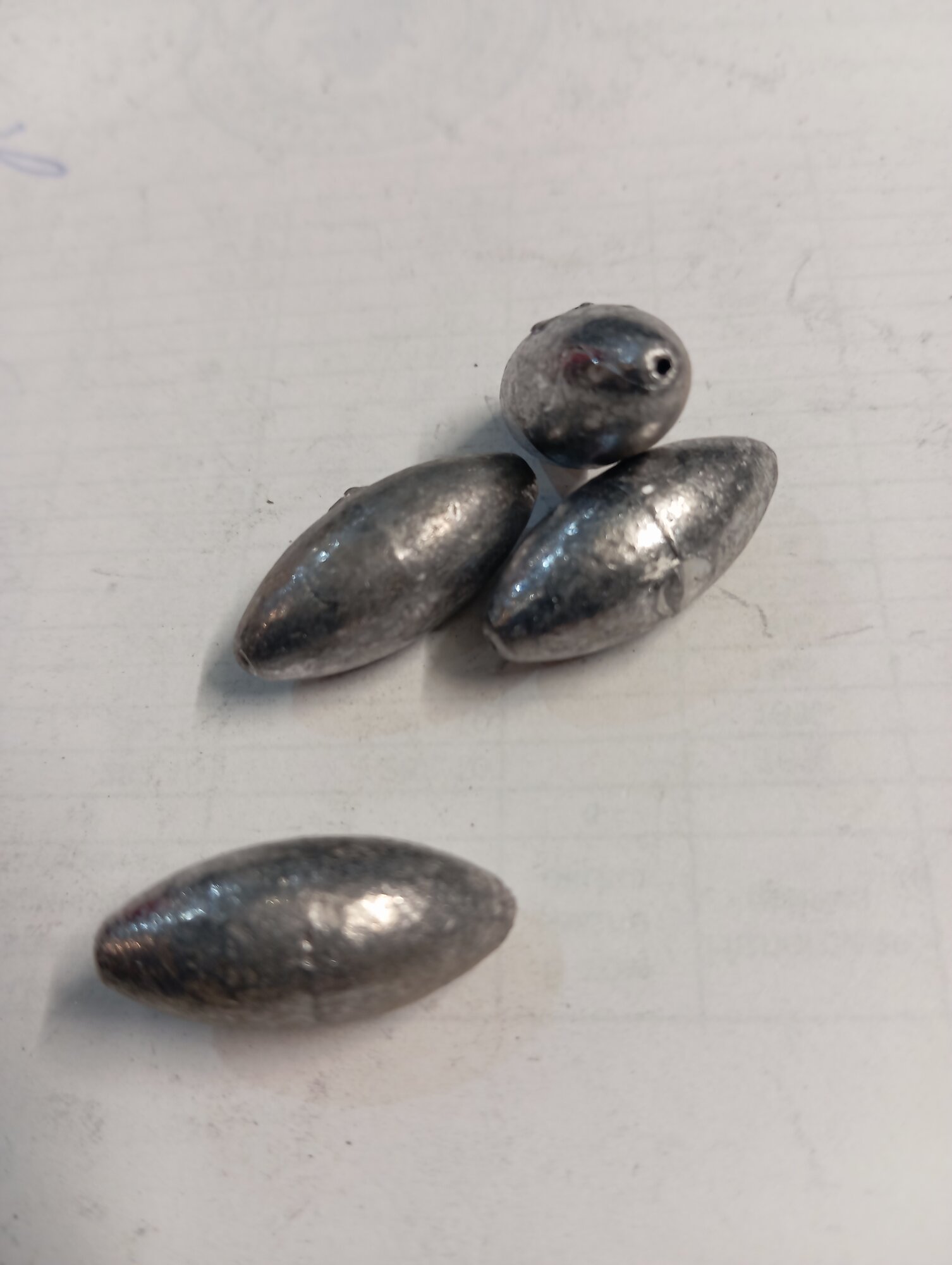 Груз свинцовый оливка сквозное отверстие. 16 грамм . упаковка 20 шт.