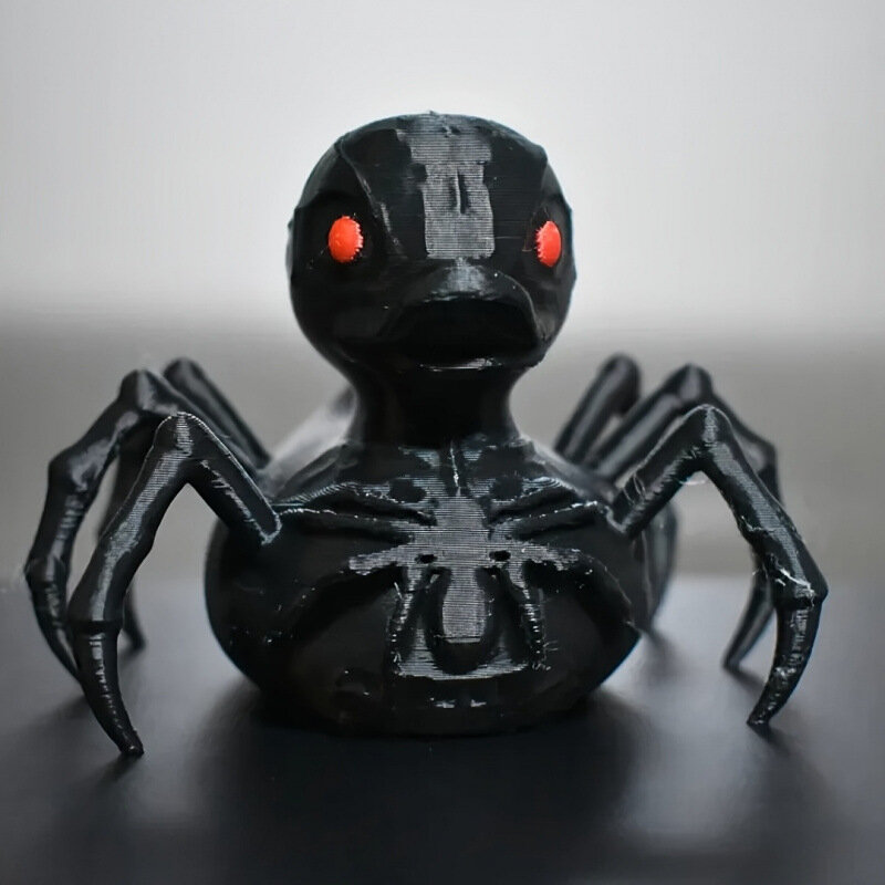 3D-печатная утка-паук — популярный трансграничный декоративный элемент, украшение для рабочего стола в виде утки-паука на Хэллоуин является бестселлером на международных рынках.