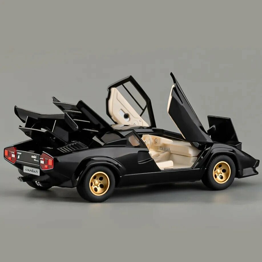 Машинка металлическая Lamborghini Countach LP500S (1:24)инерционная с открывающимися дверьми, капотом и багажникомсо световыми и звуковыми эффектами