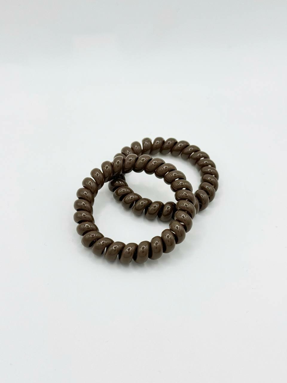 Коричневы Резинка для волос (спиральная) Спиральная резинка для волос: комфорт и стиль — фото 1