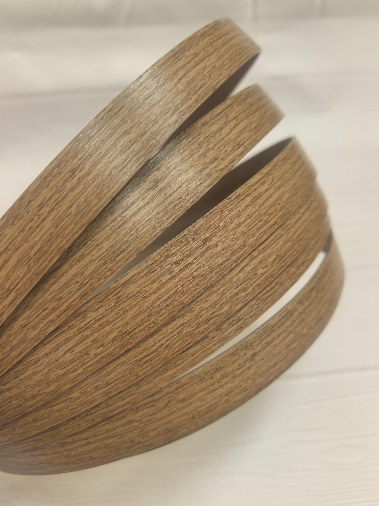 Кромка ПВХ без клея мебельная размер 2*19мм намотка 5м цвет Ясень шимо темный 342