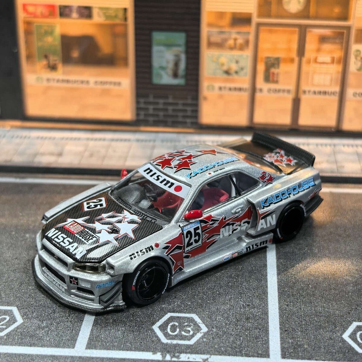 (No Packaging Box.) Машинка MINI GT X KAIDO HOUSE JDM Nissan GTR R34 STAR #25 Diecast Car Model