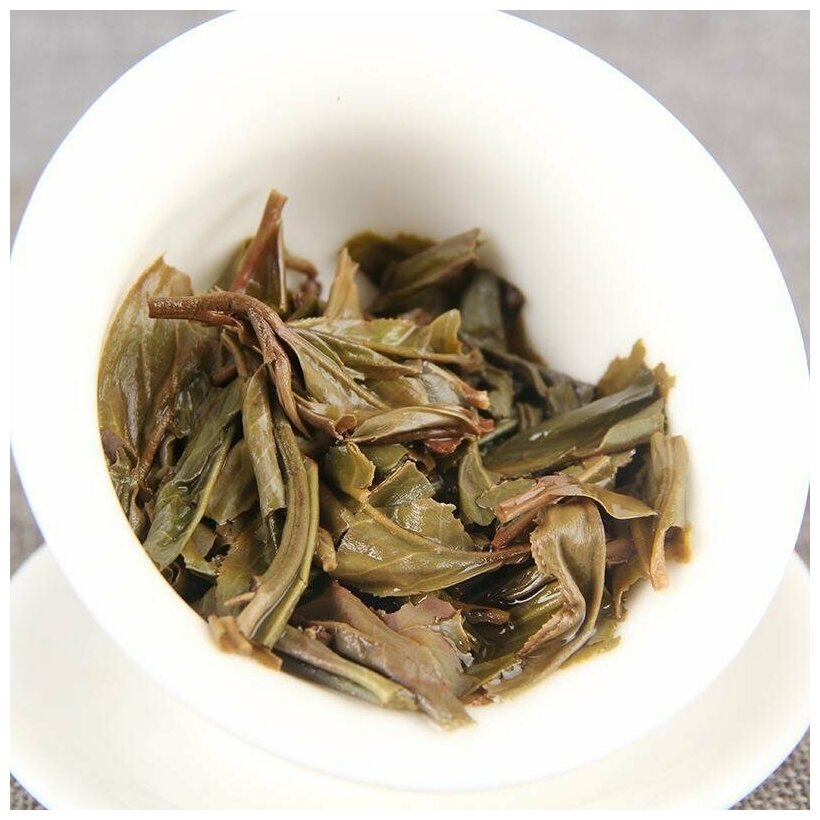 Настоящий китайский зеленый Чай Шен Пуэр У Лян Сан 2020г., блин 100 гр., прессованный зеленый чай ПуЭр - фотография № 4