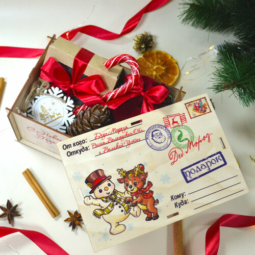 Новогодний подарок №23 с цукатами клюквы, ароматным чаем, карамелью, новогодней свечой