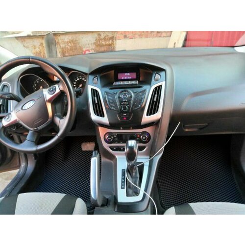 фото Автомобильные коврики eva для ford focus iii с 3d лапой, черный spc
