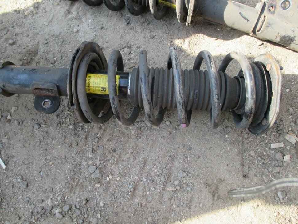 Передняя стойка шевроле лачетти