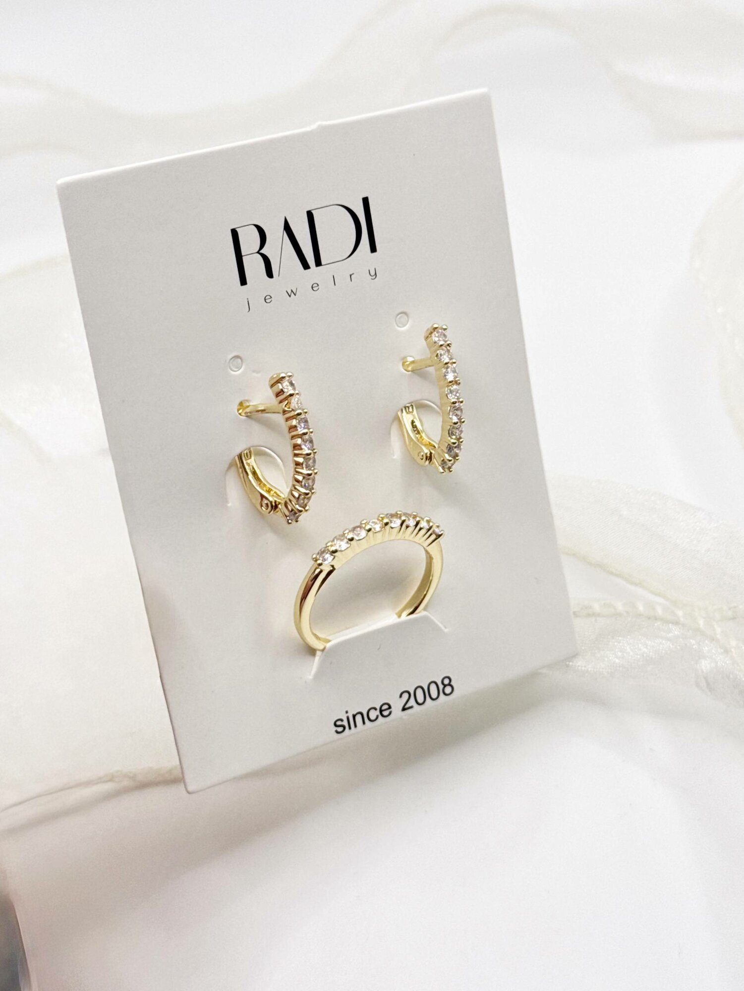 Комплект бижутерии: колье, серьги, кольцо, цепь, фианит